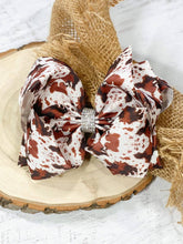 Load image into Gallery viewer, Cowhide Print Texas Size Rhinestone Center Big Bow