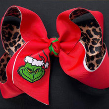 Load image into Gallery viewer, 6.5&quot; Christmas character printed bow w/red &amp; cheetah printed ribbon. $10.00