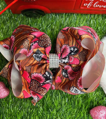 HEART PRINTED DOUBLE LAYER HAIR BOW. $10